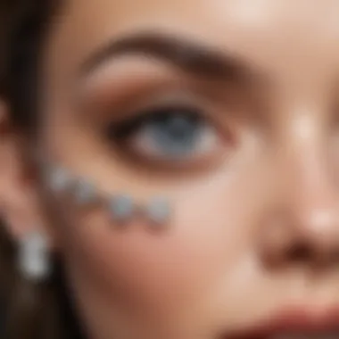 Close-up of various diamond eyebrow ring styles on display