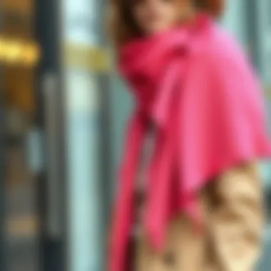 Trendy Pink Scarf Over Neutral Ensemble Trendy pink scarf draped elegantly over a neutral ensemble