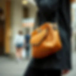 Stylish camel color crossbody bag on a modern outfit